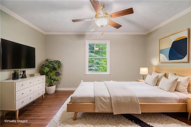 bedroom with wood finished floors, baseboards, ornamental molding, and ceiling fan