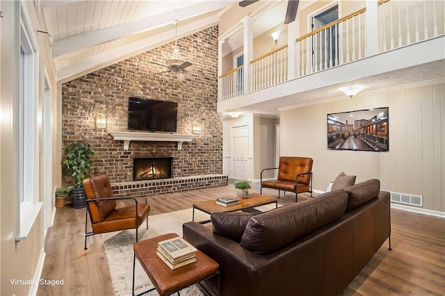 building lobby with high vaulted ceiling and beamed ceiling