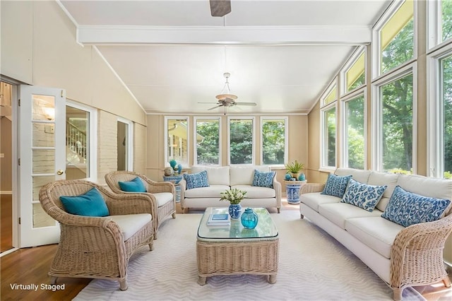 sunroom featuring wood finished floors