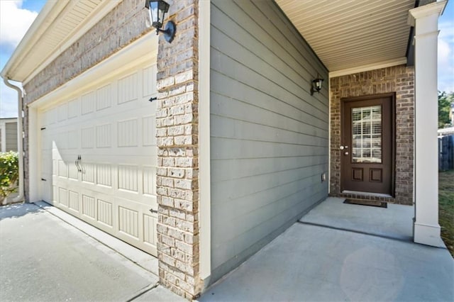 entrance to property with a garage