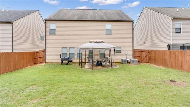 556 Emporia Loop, Mcdonough, GA 30253 - rear view of property featuring a gazebo and cooling unit