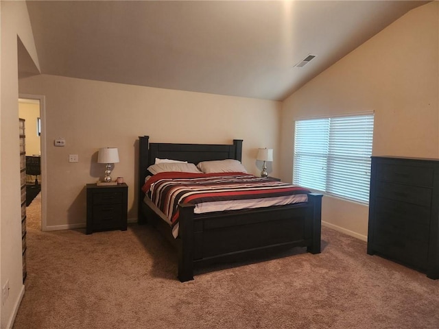 556 Emporia Loop, Mcdonough, GA 30253 - carpeted bedroom with vaulted ceiling and baseboards