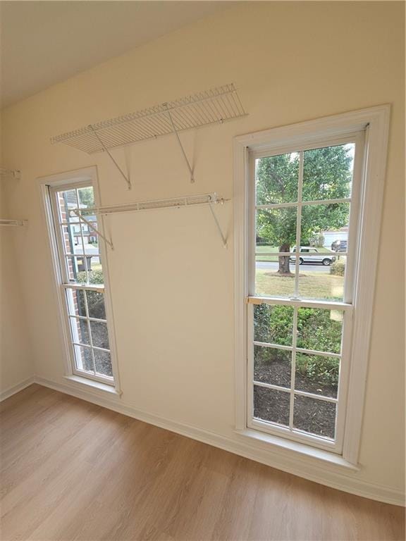 walk in closet featuring light wood-type flooring
