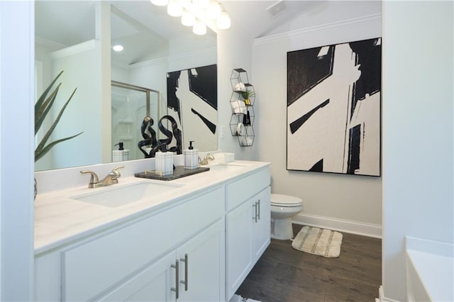 40 Eryn Ter, Covington, GA 30014 - full bath with vaulted ceiling, double vanity, a stall shower, wood finished floors, and a bath