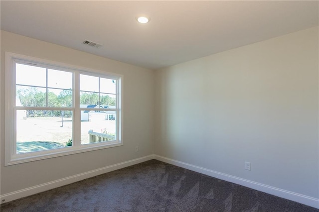 40 Eryn Ter, Covington, GA 30014 - unfurnished room with plenty of natural light, dark colored carpet, and recessed lighting