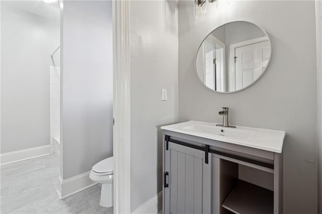 full bathroom featuring tile patterned flooring, shower / bathing tub combination, vanity, and toilet