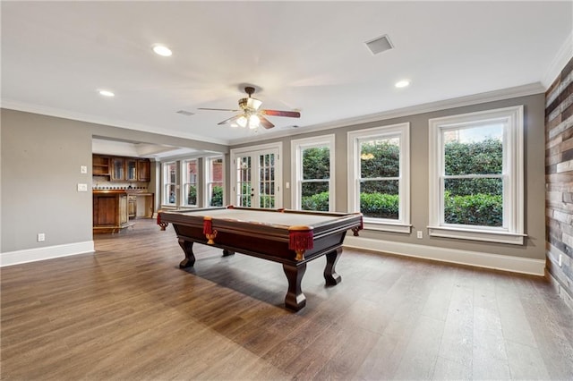 recreation room with hardwood / wood-style floors, bar area, crown molding, ceiling fan, and pool table