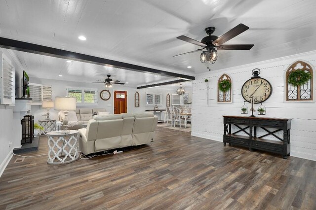 living room with ceiling fan, beamed ceiling, wood finished floors, and recessed lighting