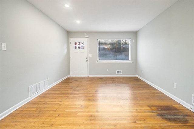 foyer with light hardwood / wood-style flooring