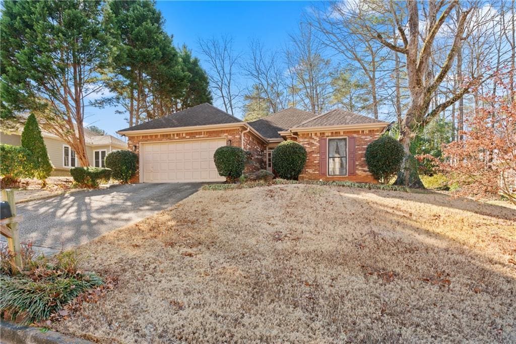 ranch-style home with a garage