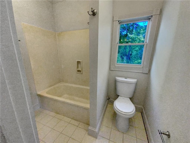 bathroom with tile patterned floors, independent shower and bath, and toilet