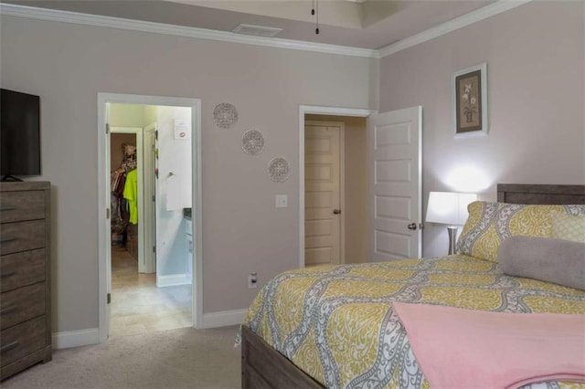 bedroom with light colored carpet and crown molding