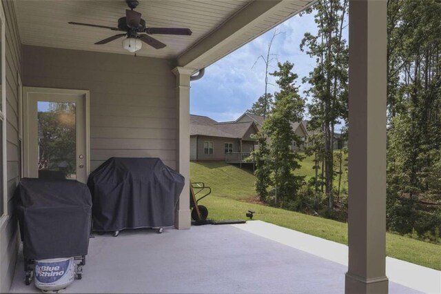 view of patio / terrace featuring ceiling fan and a grill