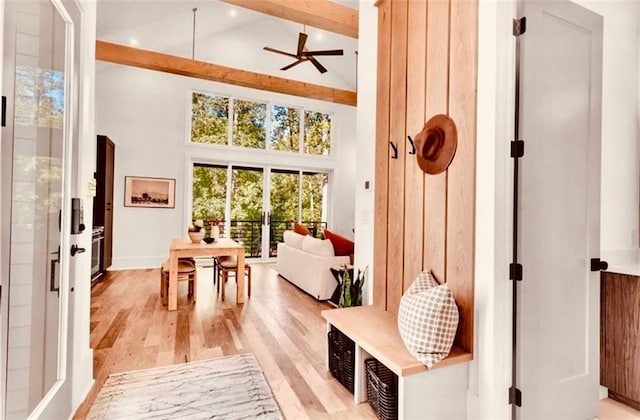 mudroom featuring light wood-type flooring, high vaulted ceiling, ceiling fan, and beam ceiling