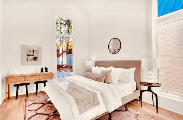 bedroom with light wood-type flooring