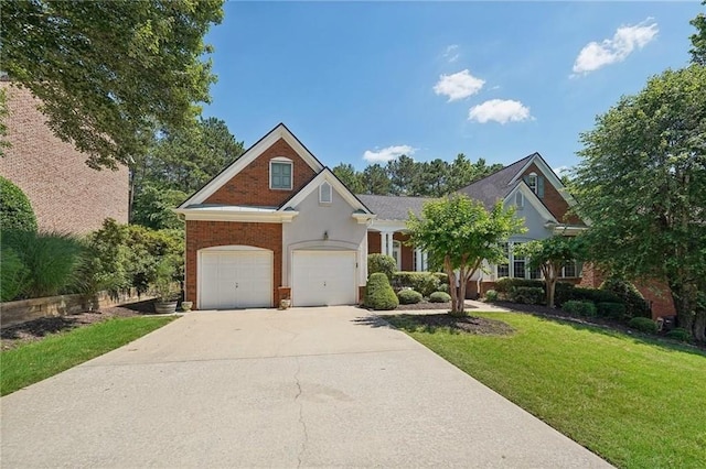 view of front facade featuring a front yard and a garage