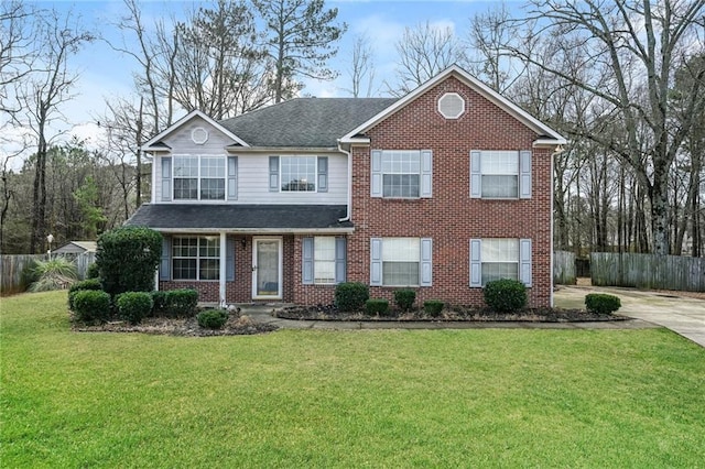 view of front of property featuring a front yard