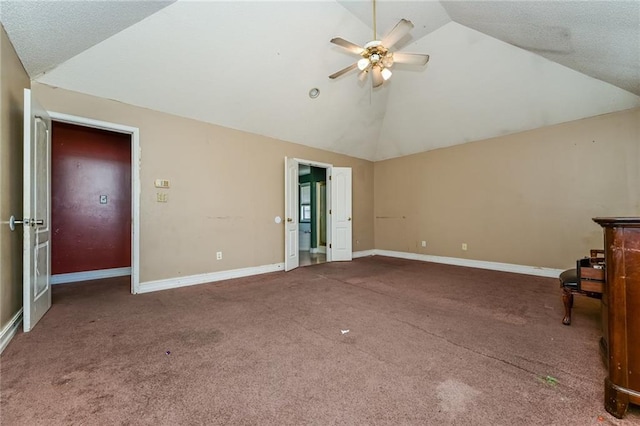 unfurnished living room featuring high vaulted ceiling, ceiling fan, and carpet flooring