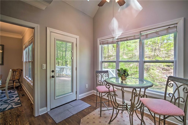 sunroom / solarium featuring ceiling fan and vaulted ceiling