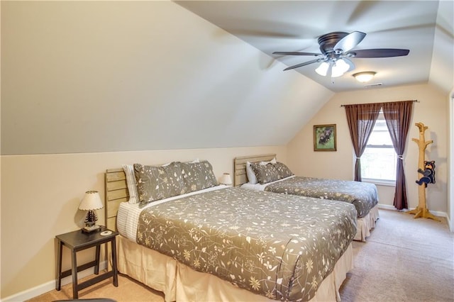 bedroom featuring ceiling fan, light colored carpet, and lofted ceiling