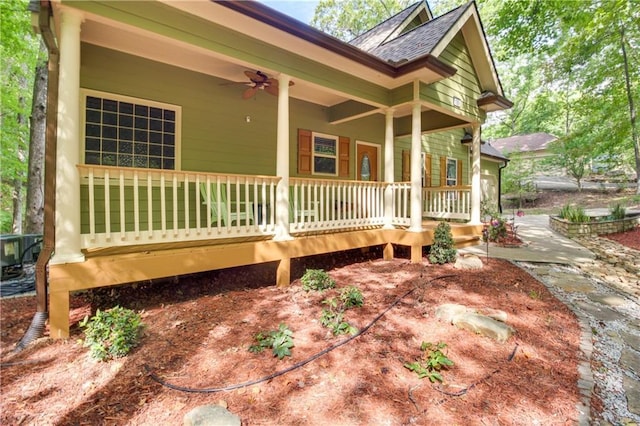 view of property exterior with ceiling fan and covered porch