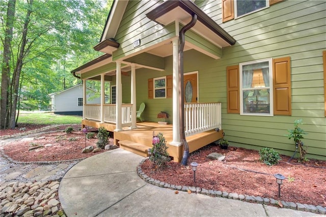 doorway to property featuring a porch