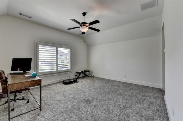unfurnished office featuring visible vents, carpet, and lofted ceiling