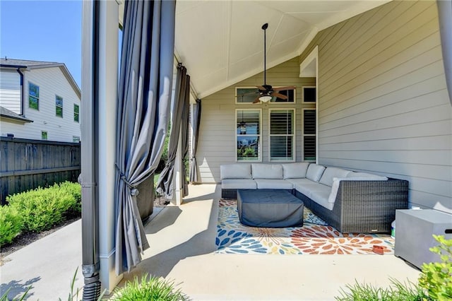 view of patio / terrace featuring an outdoor living space, a ceiling fan, and fence