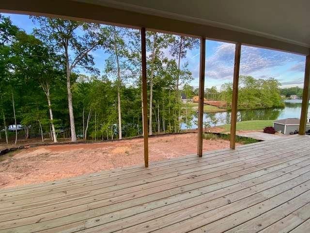 LOT35 Waterview Ct, Newnan, GA 30263 - wooden terrace with a water view and view of wooded area