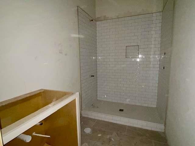 LOT35 Waterview Ct, Newnan, GA 30263 - full bath featuring tiled shower and tile patterned floors