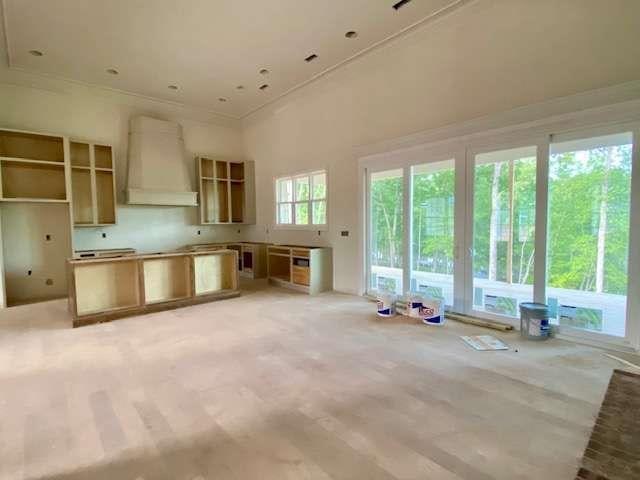 LOT35 Waterview Ct, Newnan, GA 30263 - kitchen with premium range hood and light carpet