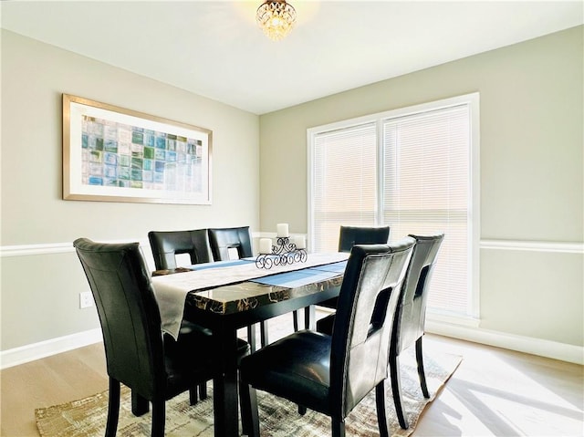 dining space with light colored carpet