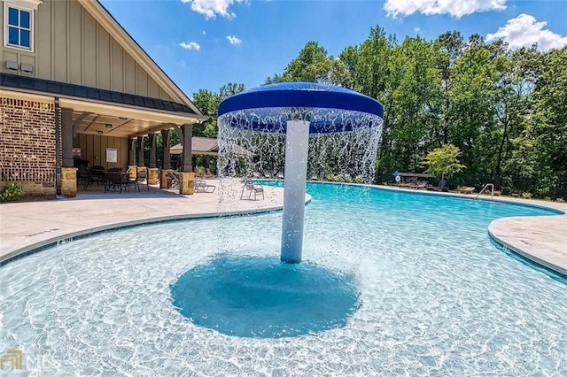 pool with a patio