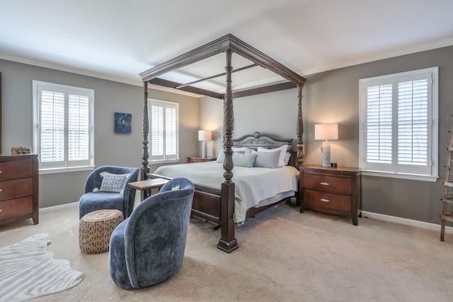 bedroom with baseboards, multiple windows, and ornamental molding