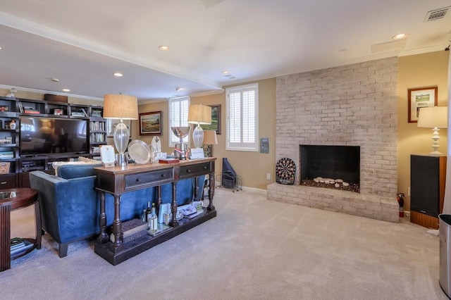 carpeted living area featuring visible vents, recessed lighting, a brick fireplace, and ornamental molding