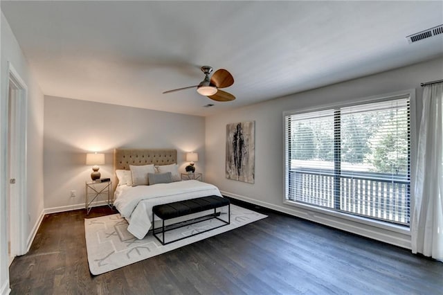 945 Tiber Cir, Alpharetta, GA 30022 - bedroom with wood finished floors, baseboards, and a ceiling fan