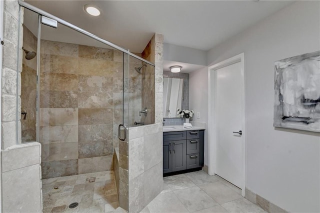 945 Tiber Cir, Alpharetta, GA 30022 - bathroom with vanity, a shower stall, tile patterned flooring, and recessed lighting