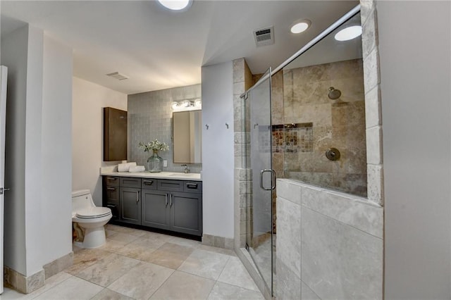 945 Tiber Cir, Alpharetta, GA 30022 - bathroom with vanity, toilet, a stall shower, tile patterned flooring, and baseboards