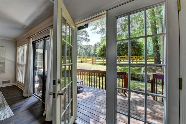 945 Tiber Cir, Alpharetta, GA 30022 - doorway to outside with ornamental molding, wood finished floors, and baseboards