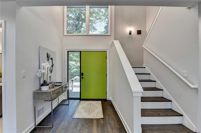 945 Tiber Cir, Alpharetta, GA 30022 - foyer entrance featuring dark wood finished floors, stairs, and baseboards