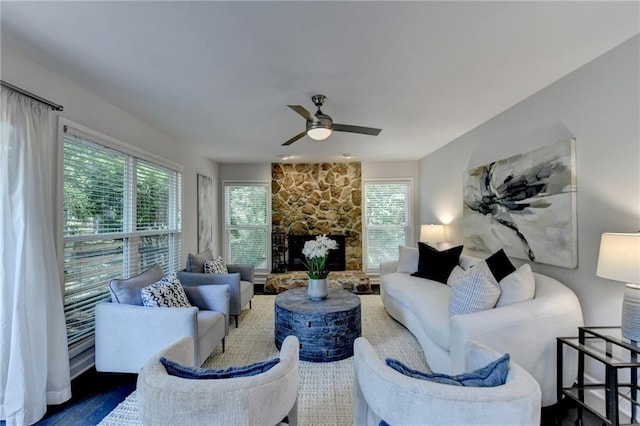 945 Tiber Cir, Alpharetta, GA 30022 - living area with ceiling fan, wood finished floors, and a fireplace