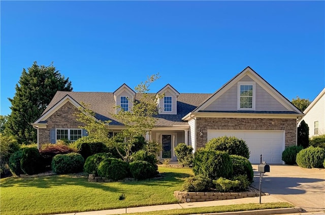2642 Colleen Ln, Dacula, GA 30019 - view of front of property featuring stone siding, concrete driveway, a front yard, and an attached garage