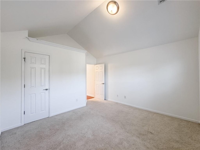 2642 Colleen Ln, Dacula, GA 30019 - unfurnished bedroom featuring carpet, lofted ceiling, and baseboards