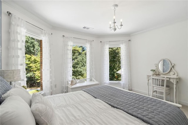 bedroom featuring carpet flooring, an inviting chandelier, and ornamental molding