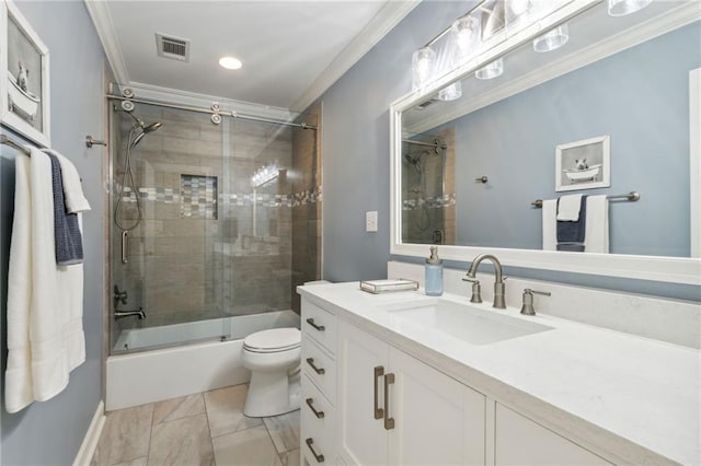 full bathroom featuring toilet, tile patterned flooring, crown molding, vanity, and bath / shower combo with glass door