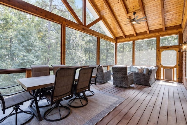 sunroom featuring wooden ceiling, ceiling fan, and vaulted ceiling with beams