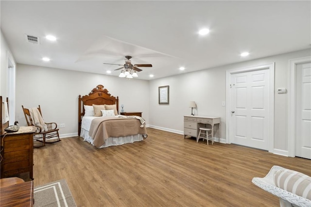 bedroom with light wood-type flooring and ceiling fan