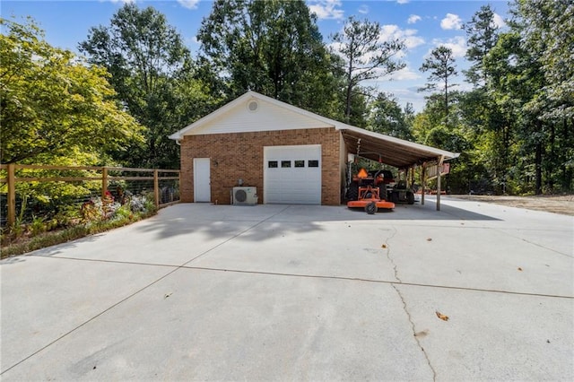 garage featuring a carport