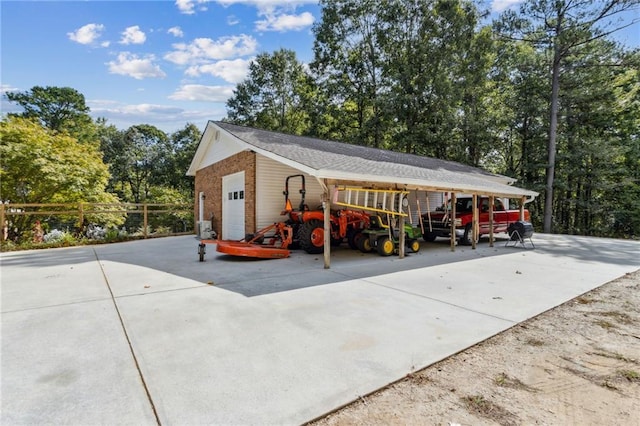 exterior space featuring an outdoor structure and a garage