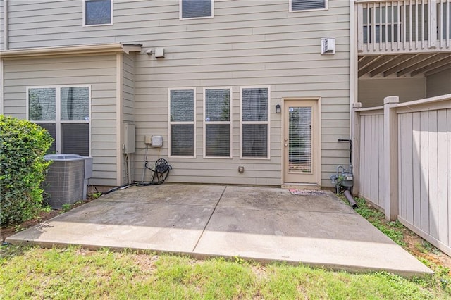 exterior space with a patio area and central air condition unit